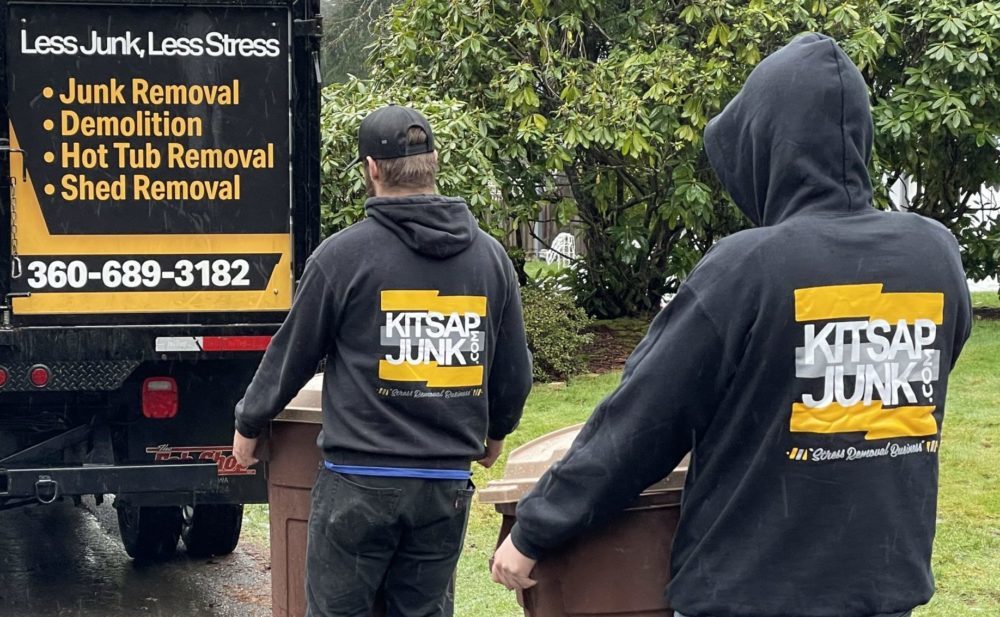 Kitsap Junk Removal employees hauling away junk